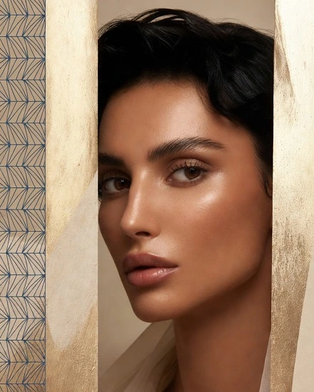 Close up profile of a Saudi woman with radiant skin and geometric 4D mapping lines, representing Dr  Dina Khalil's medical precision and VIP aesthetics at Maraya Clinic Cairo for GCC international guests 